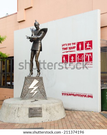 HAMILTON, NEW ZEALAND - DECEMBER 3 2011: A statue in tribute to Richard O\'Brian, creator of Rocky\'s Horror Picture Show and instructions on how to do the time warp