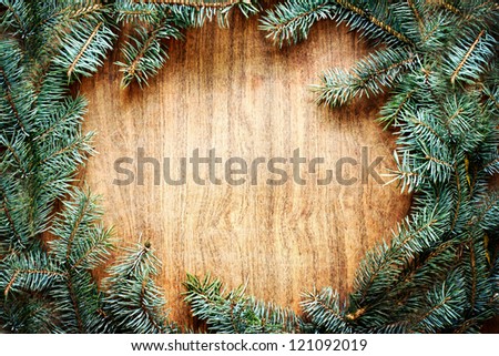Christmas fir tree on a wooden board/Christmas green framework