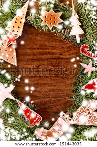 Christmas green framework with christmas decorations/ Wooden frame with Christmas tree branches and vintage decorations