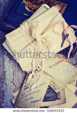 old lettersand post cards. nostalgic vintage background/ Vintage Letters,Photos of Memories, toned image