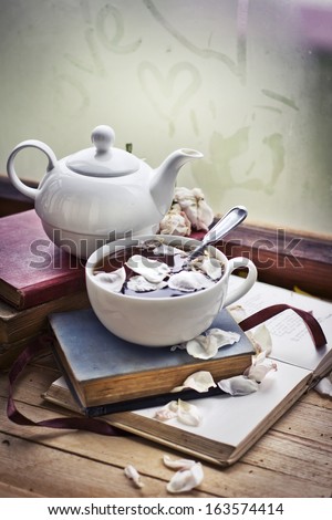 Rose tea/Healthy Tea with rose petals and  books