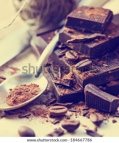 Closeup of Cocoa Powder and Dark Chocolate/ Chopped chocolate with cocoa