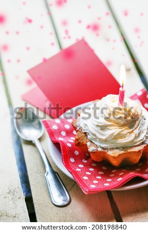 Holidays background with Birthday cupcake/  Birthday greeting card with cupcake and candle