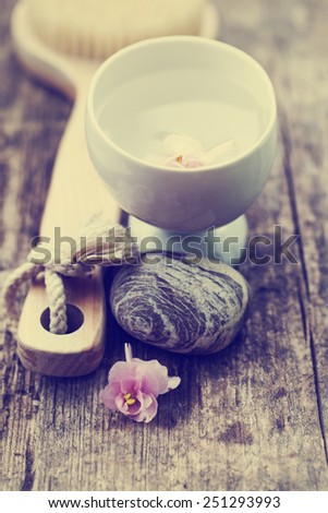 Spa concept background with flower, water and stone