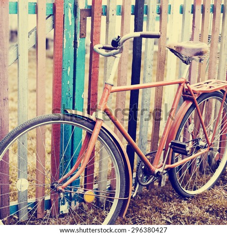 Vintage Bicycle / Vintage background with bicycle (toned picture)