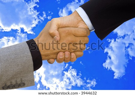 Good business team work! Handshake to seal the agreement
