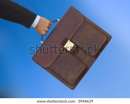A businessman run to the job meeting at the office with the diplomatic bag