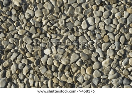 Detail of gray rounded river pebbles, great background