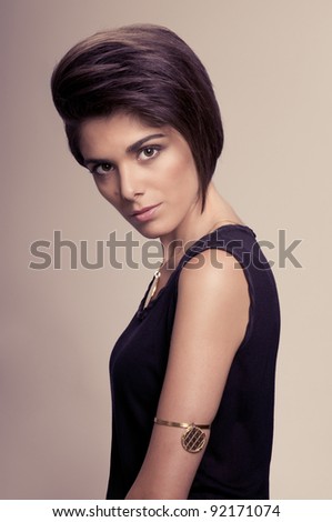 Beautiful fashion woman with straight short hairstyle posing