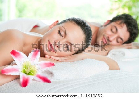 Beauty woman and man relaxing together during a spa treatment