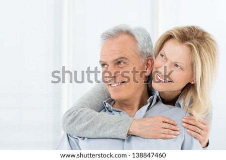 Portrait Of Happy Senior Couple Smiling