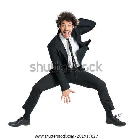 Portrait Of Happy Smiling Man In Suit Jumping Isolated On White Background