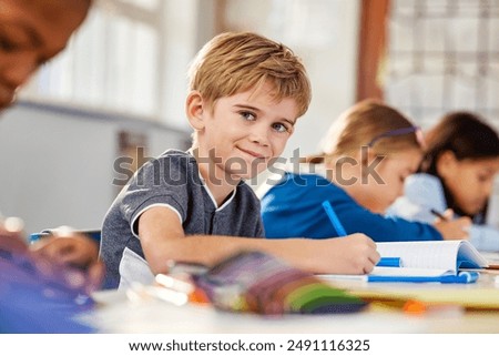 Similar – Image, Stock Photo Child doing homework