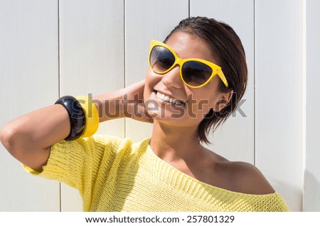 Portrait Of Young Pretty Woman In Casual With Summer Glasses