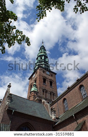Nikolaj Church in Copenhagen with its copper clad spire from 1909 built in Renaissance style.