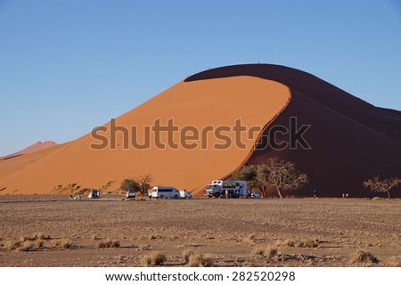 Huge sand dunes seen early in the morning in Sossusvlei Park on a guided tour