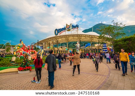 OCEAN PARK, HONGKONG - DECEMBER 9: Tourist Group on December 9, 2014, Ocean Park, Hongkong.  Tourists group on the entertainment park. Ocean Park also a center for giant panda breeding.
