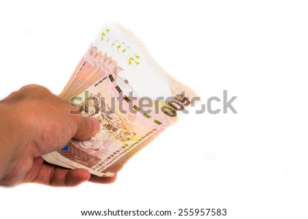 Banknote hkd in hand pay for goods and service, Hong Kong $500 banknote