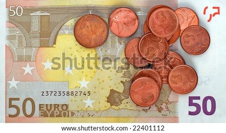Fifty euro banknote reverse and small copper coins