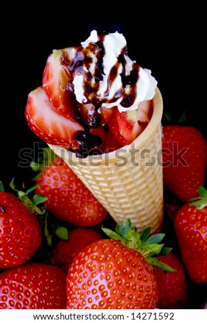 Strawberry and whipped cream dessert in a cone