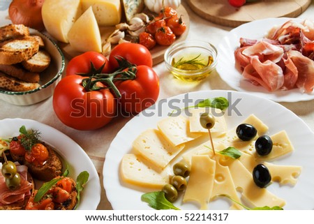 Cheese, prosciutto and other traditional italian appetizer food