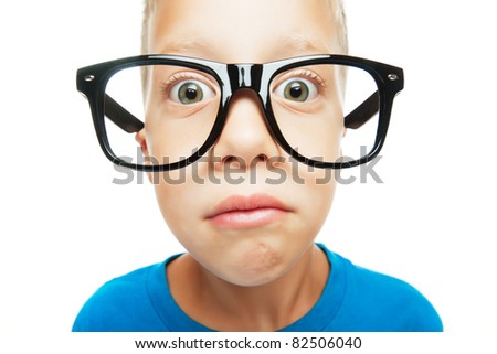 Young boy with nerd glasses isolated on white background
