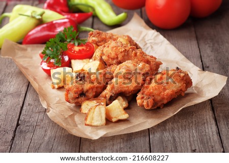Southern fried chicken wings with spicy potato