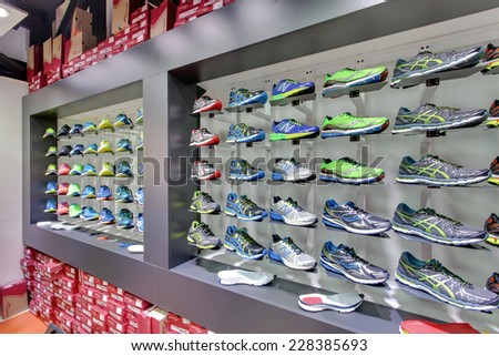 KIEV, UKRAINE - OCTOBER 26 2014: Exposition of New Balance and Saucony sport shoes. They are one of the world\'s largest suppliers of athletic shoes and apparel. October 26, 2014 in Kiev Ukraine