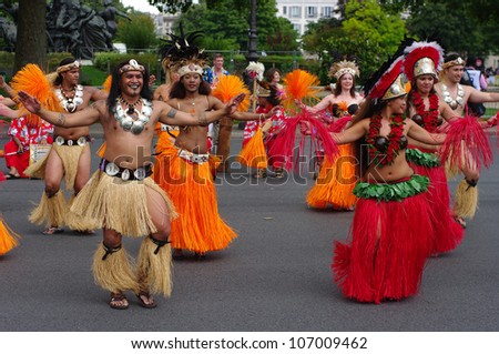 PARIS, FRANCE - JULY 07 : Carnival of the tropical dances with over 4000 participants from all over the globe organized in Paris, France 07.07.2012
