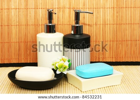 Soap dispensers and bars on bamboo.