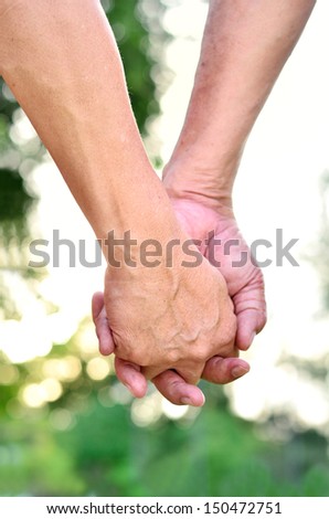 Old couple hands