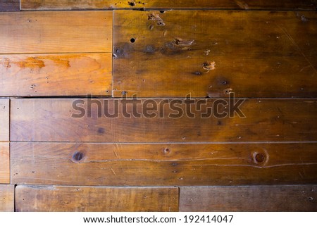Wood wall texture made out of reclaimed recycled lumber from a wooden barn.