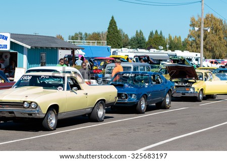 WOODBURN, OR - SEPTEMBER 27, 2015: Classic cars line up to race in the nostalgia division at the NHRA 30th Annual Fall Classic at the Woodburn Dragstrip.