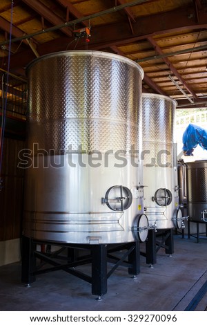 Stainless steel wine tanks aging fine wines in Southern Oregon.