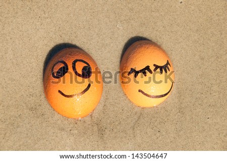 easter funny eggs  on a beach.