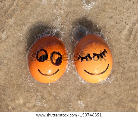 easter funny eggs  on a beach.