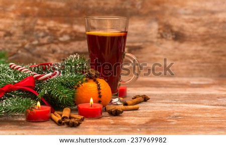 Christmas tree, mandarine, glogg and candles.  christmas background theme