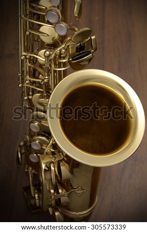 saxophone in wood background