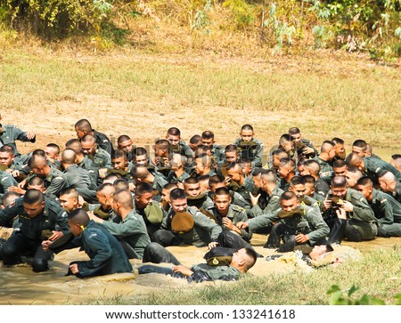 UBONRATCHATHANI, THAILAND-JANUARY 31: Unidentified army students training hard in training camp to prepare for battle on January 31, 2013 in Ubonrfatchathani, Thailand