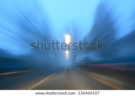 Tunnel vision of a road with motion blur during fall