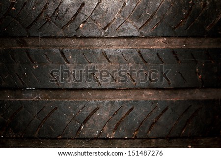 a photo of old dirty tire foot print close up for background,grunge style