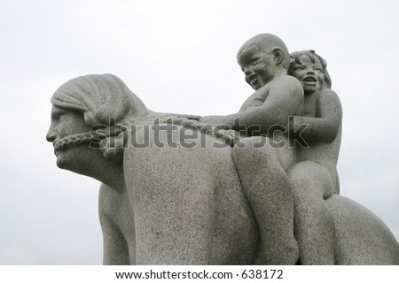 Two children riding on their mother like a horse at Vigeland Sculpture Park, Oslo Norway.  (Frognerparken)