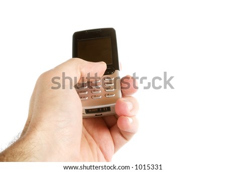 A hand text messaging with a cell phone, isolated on white with a clipping path.
