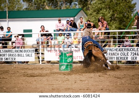 Barrel racing at a small town rodeo in Saskatchean
