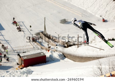 VIKERSUND, NORWAY - MARCH 15: Johan Remen Evensen of Norway competes in the FIS World Cup Ski Jumping Competition on March 15, 2009 in Norway.