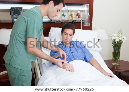 Technician doing a routine check up of the patient