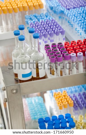 Test tubes and bottles arranged on medical trolley