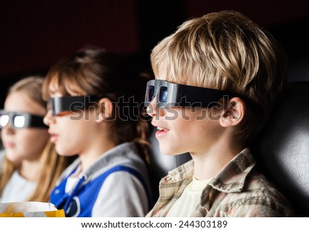 Similar – Image, Stock Photo Focused boy watching films on tablet