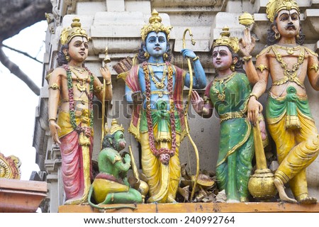 FEBRUARY 25, 2014, BANGALORE, KARNATAKA, INDIA - Sculpture of Sita, Rama, Lakshman and Hanuman  on the wall of the Hindu temple