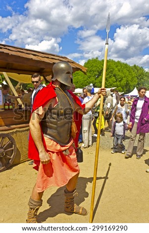 JUNE 6, 2015,  MOSCOW, RUSSIA - Festival of the historic reconstruction Times and Ages in the park Kolomenskoye. Brutal ancient Greek warrior